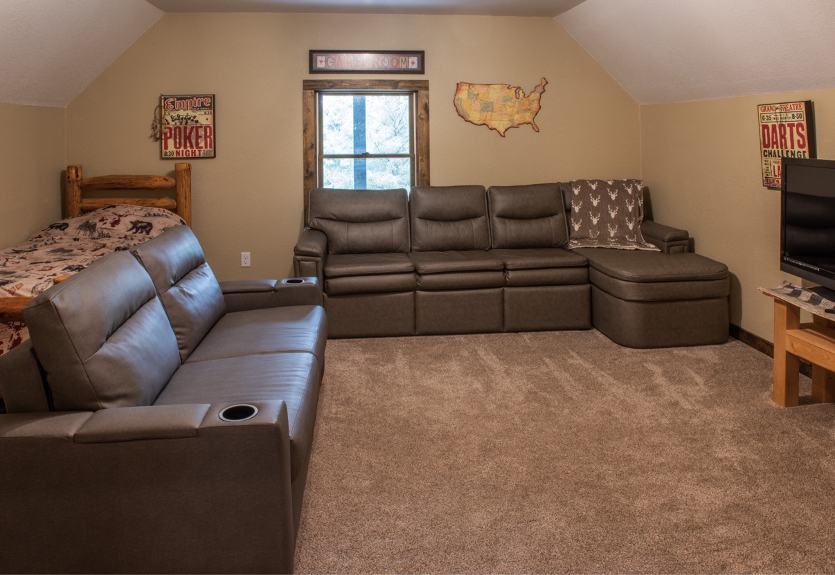 Loft game room with sectional seating