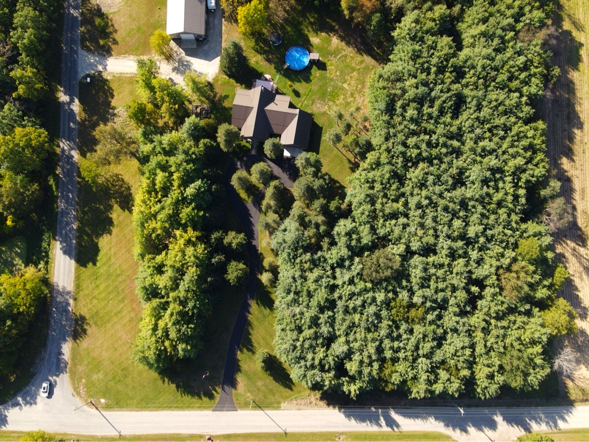 Top down aerial of full 7 acre wooded property